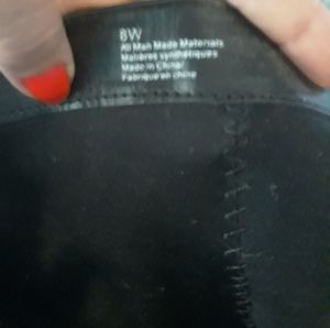 Black leather tall zip up boots made by express